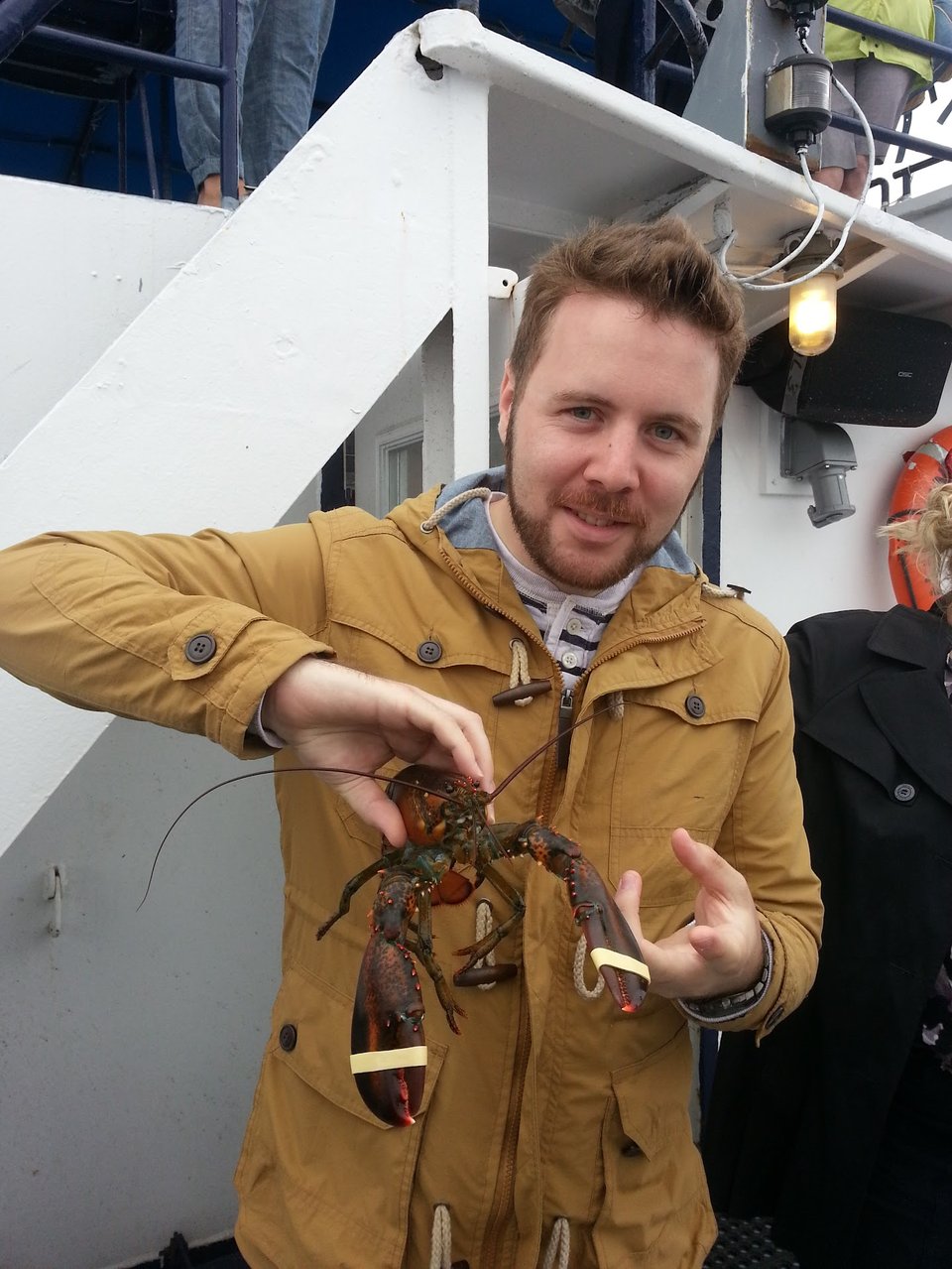 Here’s me in Canada a decade ago with a lobster, which isn’t specifically what I’m writing about today but it’s close enough.